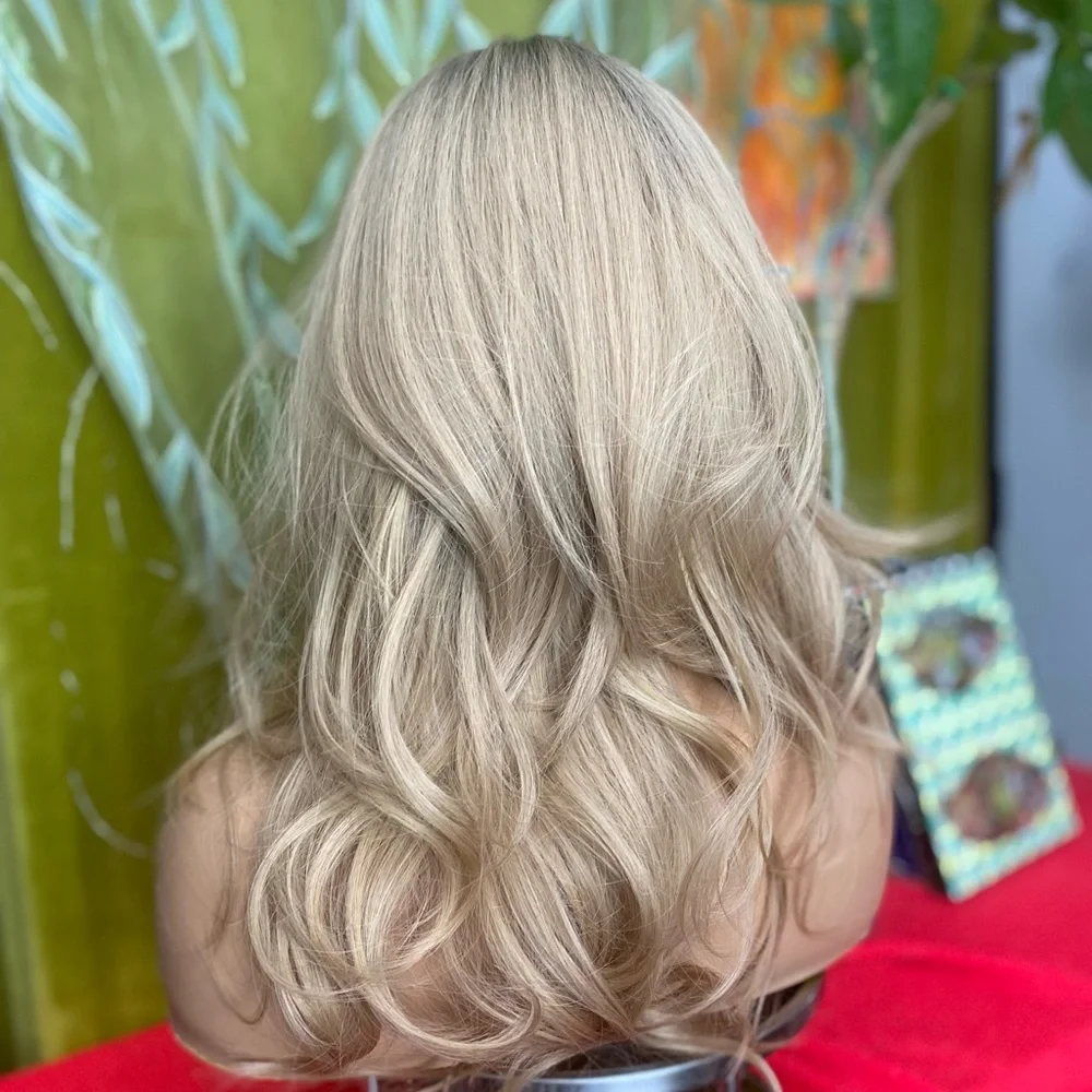 Golden dirty blonde layered wig with bangs and roots